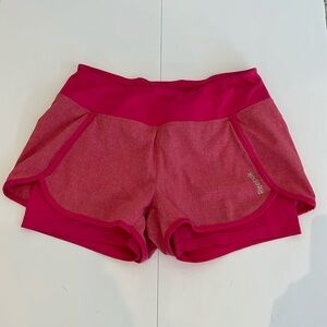Reebok Pink Athletic Shorts, lined underneath 
With back pocket in waist